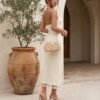 Ivory Textured Halter Midi Dress with Tassel Hem