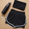 Black High-Waist Dolphin Swim Shorts with White Trim