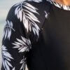 BS-SWM-131_2 Black Long-Sleeve Boyleg Swim Romper with Tropical Print Sleeves