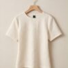 b4c09dbf-21f5-4a7a-a62e-d3489401f730 Textured Jacquard T-Shirt — Cream, Embossed Floral Fan Pattern
