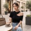 ca8f8351-0295-4751-b395-f75ac1eedb60 Asymmetric Cut-Out Shoulder Top — Black, Short Sleeve Fitted