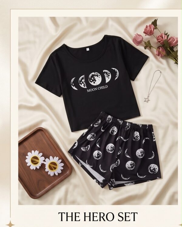 e3f53725-ec6c-4f02-aba7-543c4d43fca1 “Moon Child” Pyjama Set — Black Moon Phase Print Tee & Shorts
