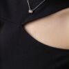 e531a99d-b111-441f-8143-0fd106e759a0 Asymmetric Cut-Out Shoulder Top — Black, Short Sleeve Fitted