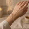 Gold-Tone Stainless Steel White Clover Bracelet – Mother-of-Pearl Charm Links