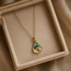 img_0218 Gold-Tone Stainless Steel Palm Tree Island Necklace – Enamel & Pearl Charm