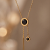 img_0220-2 Gold-Tone Stainless Steel Lariat Necklace – Black Onyx Drop Pendants