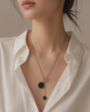 Gold-Tone Stainless Steel Toggle Lariat Necklace – Black Onyx Disc Pendants