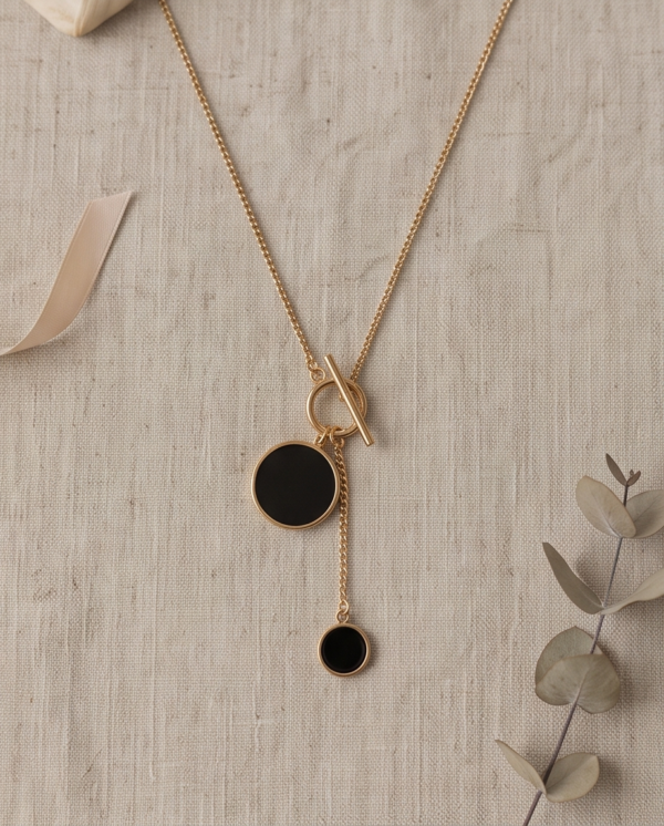 Gold-Tone Stainless Steel Toggle Lariat Necklace – Black Onyx Disc Pendants