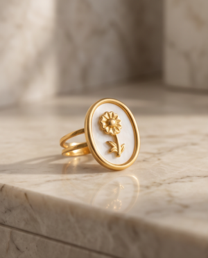 img_0750-2 Gold-Tone Stainless Steel Enamel Flower Ring – White Oval Signet Design