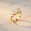 img_0758 Gold-Tone Stainless Steel Sunburst Ring – White Stone Sun Design