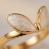 img_0759 Gold-Tone Stainless Steel Sunburst Ring – White Stone Sun Design