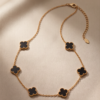 Gold-Tone Stainless Steel Clover Charm Necklace – Black, Grey & White Enamel