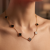Gold-Tone Stainless Steel Clover Charm Necklace – Black, Grey & White Enamel