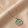 img_0829 Gold-Tone Stainless Steel Shell Pendant Necklace – Ombré Starfish & Pearl Charm