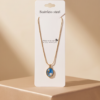 Gold-Tone Stainless Steel Blue Seahorse Pendant Necklace – Pearl Accent