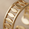 img_0888 Gold-Tone Stainless Steel Open Cutout Ring – Leaf Link Design