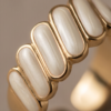 Gold-Tone Stainless Steel White Enamel Ribbed Ring – Segmented Design