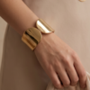 Wide Polished Hinged Cuff Bracelet — Gold-Tone Stainless Steel, Minimalist