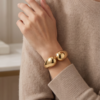 Chunky Dome Cuff Bracelet — Gold-Tone Stainless Steel, Hinged Spring Opening