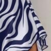 screenshot-56 Navy Zebra Print Swim Dress – Scoop Neck One-Piece with Flared Skirt