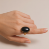 img_9623-2 Vintage Gold-Tone Oval Black Onyx Statement Ring – Braided Edge Detail