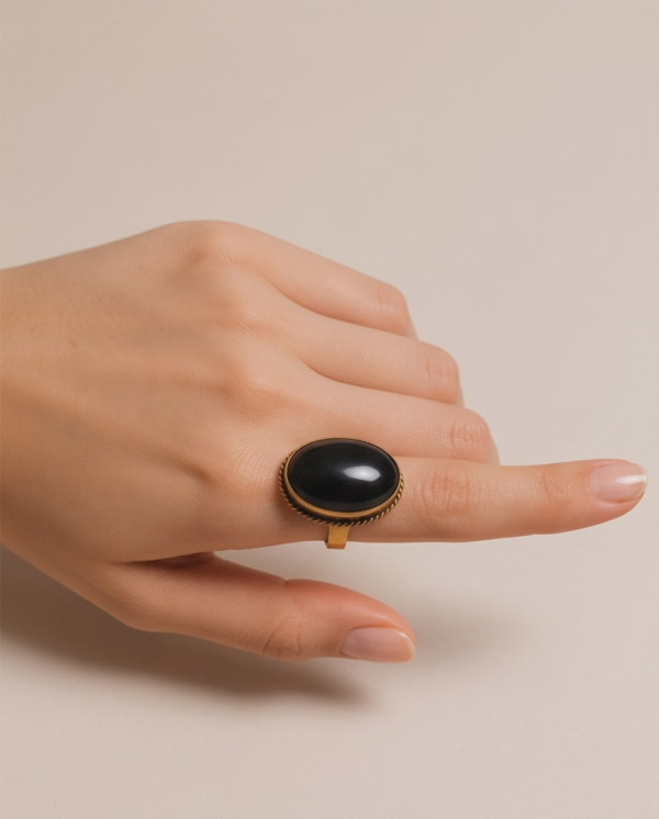 img_9623-2 Vintage Gold-Tone Oval Black Onyx Statement Ring – Braided Edge Detail