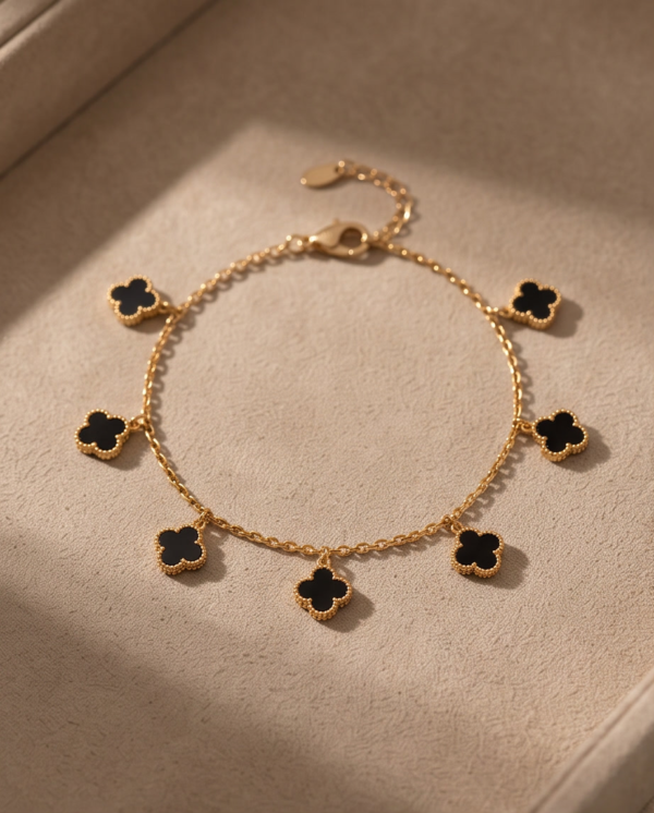 Stainless Steel Chain Bracelet with Black Clover Charms – Gold-Tone