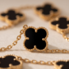 Stainless Steel Chain Bracelet with Black Clover Charms – Gold-Tone