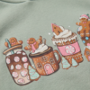 Gingerbread Hot Cocoa Print Hoodie — Sage Green Kids’ Pullover (Age 12)