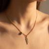 img_2190 Gold Feather & Emerald Baguette Necklace — Stainless Steel Curb Chain